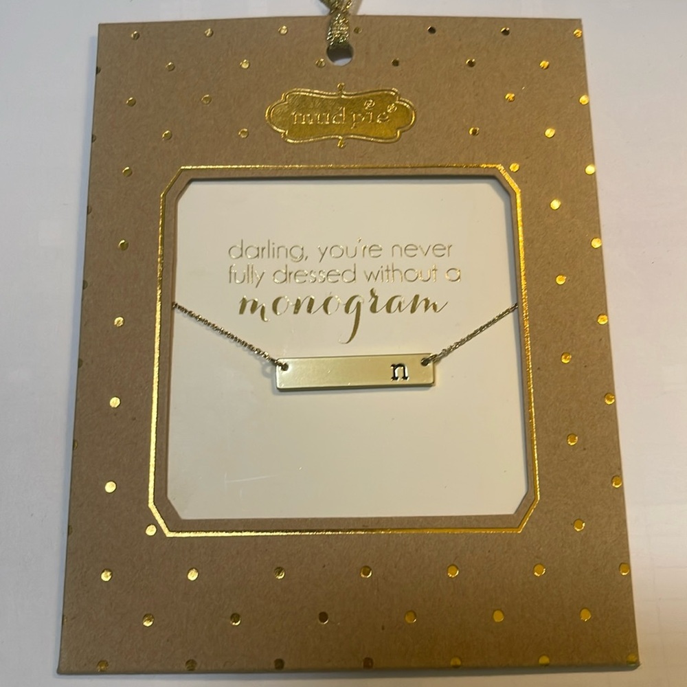 Initial “n” gold bar necklace by mudpie